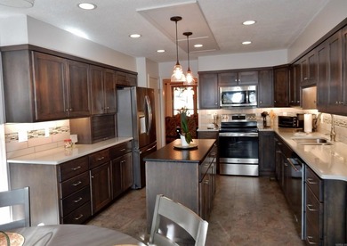Step into the beautifully remodeled kitchen, designed to inspire - photo 11