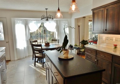 Step into the beautifully remodeled kitchen, designed to inspire - photo 13