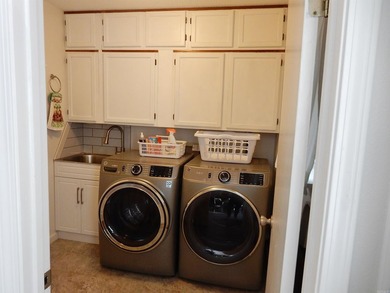 Step into the beautifully remodeled kitchen, designed to inspire - photo 19