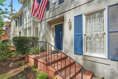 Tucked into a walkable enclave of town, this two-story townhome - photo 6