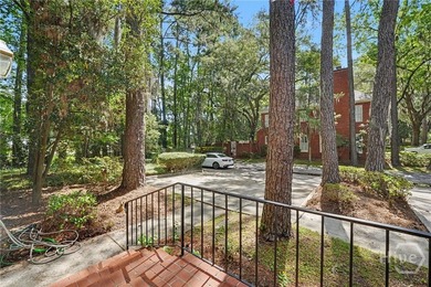 Tucked into a walkable enclave of town, this two-story townhome - photo 7