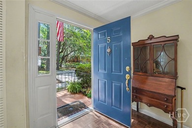 Tucked into a walkable enclave of town, this two-story townhome - photo 8