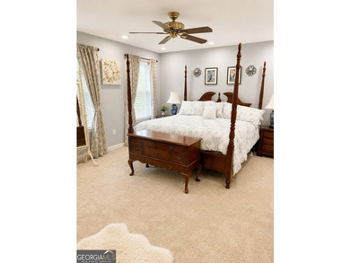 Welcome home to this beautiful 4-bedroom, 3-bath retreat nestled - photo 19