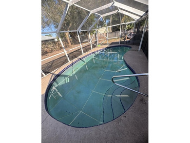 Investment opportunity awaits! This charming 3-bedroom pool home - photo 4