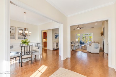 This elegant all-brick, one-level home is perfectly situated in