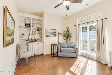 This elegant all-brick, one-level home is perfectly situated in