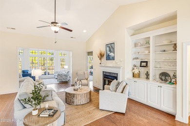 This elegant all-brick, one-level home is perfectly situated in