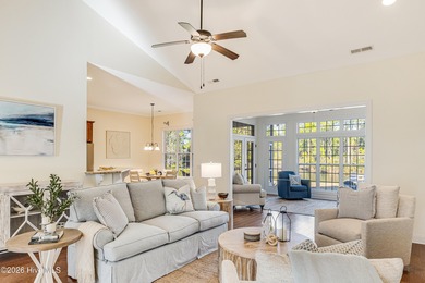 This elegant all-brick, one-level home is perfectly situated in