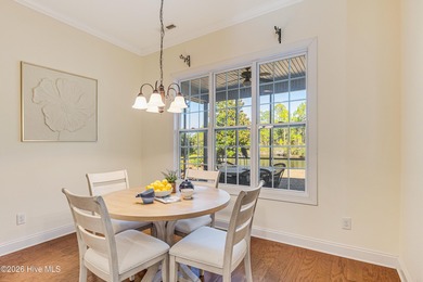 This elegant all-brick, one-level home is perfectly situated in