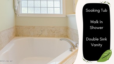 This elegant all-brick, one-level home is perfectly situated in