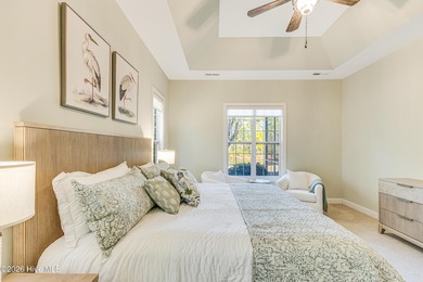 This elegant all-brick, one-level home is perfectly situated in