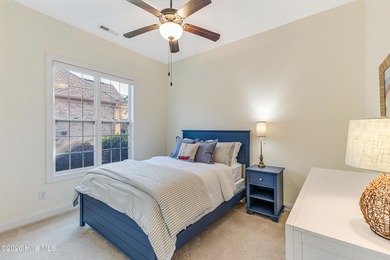 This elegant all-brick, one-level home is perfectly situated in