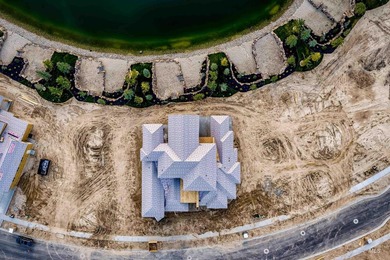 Set on its own private waterfront within the highly sought-after - photo 11