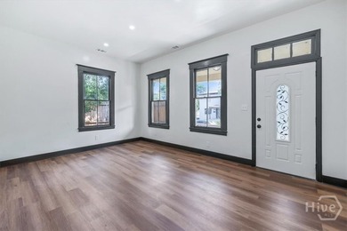 Welcome to 604 W. 40th Street, where timeless charm meets modern - photo 8