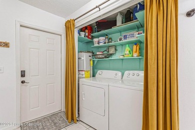 Welcome home to this cozy 2 bed 1 bath residence in Palm Bay - photo 11