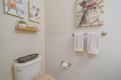 Well-appointed Brightwaters Model 2 story townhouse located in - photo 12