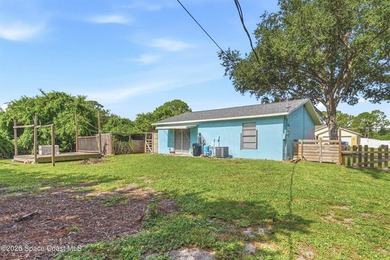 Welcome home to this cozy 2 bed 1 bath residence in Palm Bay - photo 13