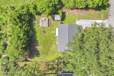 Welcome home to this cozy 2 bed 1 bath residence in Palm Bay - photo 14