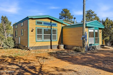 Tucked among the peaceful pines of Airpine, AZ, this remodeled
