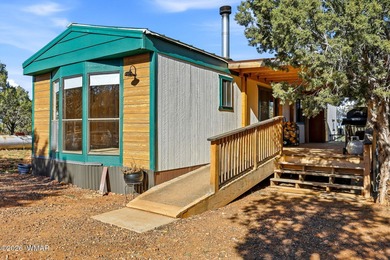 Tucked among the peaceful pines of Airpine, AZ, this remodeled