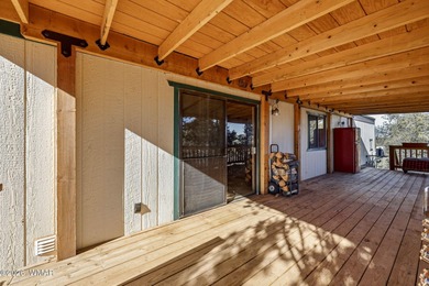 Tucked among the peaceful pines of Airpine, AZ, this remodeled