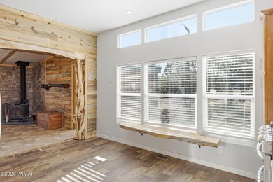 Tucked among the peaceful pines of Airpine, AZ, this remodeled