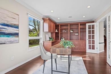 Discover luxurious, low-maintenance living just steps from the - photo 7