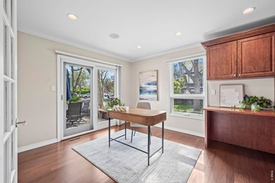 Discover luxurious, low-maintenance living just steps from the - photo 8