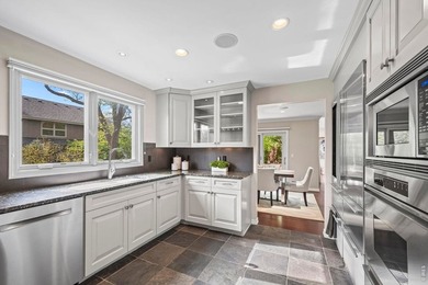 Discover luxurious, low-maintenance living just steps from the - photo 9