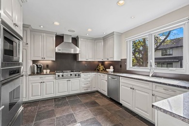 Discover luxurious, low-maintenance living just steps from the - photo 10