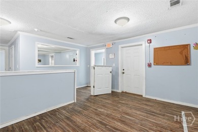 Property set up as a daycare facility. Features classrooms, a - photo 5