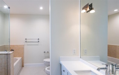 Gorgeous  2,200 SF condo only steps to the beach!  Two bedrooms