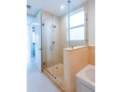 Gorgeous  2,200 SF condo only steps to the beach!  Two bedrooms