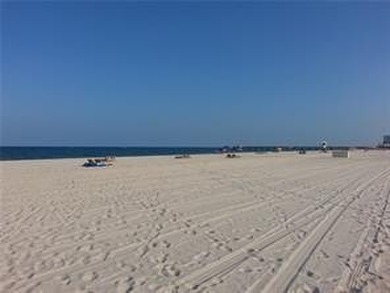 Gorgeous  2,200 SF condo only steps to the beach!  Two bedrooms