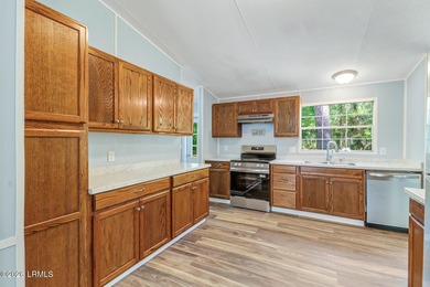Fully renovated 4 bed, 2 bath mobile home offering modern - photo 11