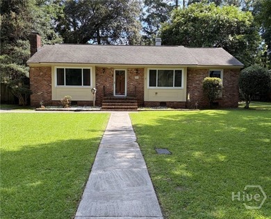 Charming 3-bedroom, 2-bath bungalow in a highly desirable - photo 1