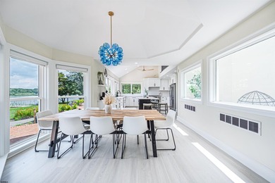 Experience luxurious riverfront living in this fully renovated - photo 12