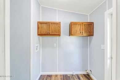 Fully renovated 4 bed, 2 bath mobile home offering modern - photo 13