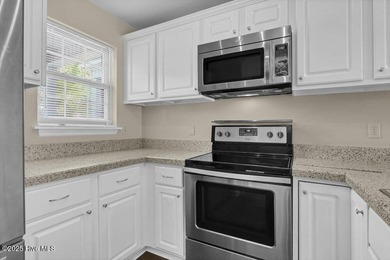 Beautifully updated townhome offering style, comfort, and - photo 5