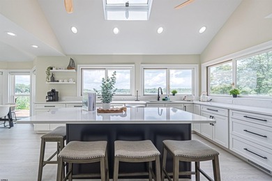 Experience luxurious riverfront living in this fully renovated - photo 16