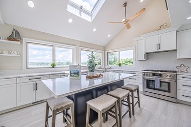 Experience luxurious riverfront living in this fully renovated - photo 17