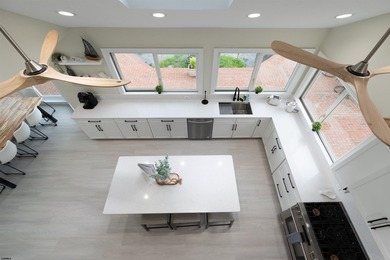 Experience luxurious riverfront living in this fully renovated - photo 18