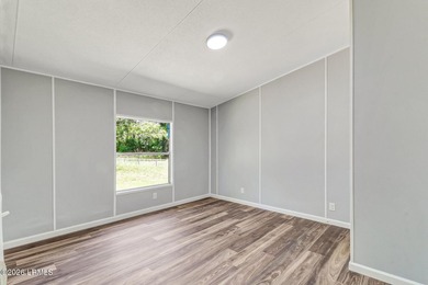 Fully renovated 4 bed, 2 bath mobile home offering modern - photo 19