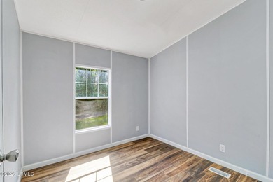 Fully renovated 4 bed, 2 bath mobile home offering modern - photo 20