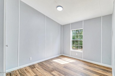 Fully renovated 4 bed, 2 bath mobile home offering modern - photo 21
