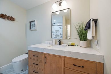 Experience luxurious riverfront living in this fully renovated - photo 21