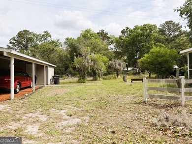 CHARMING TWO-BEDROOM EFFICIENCY COTTAGE TUCKED AWAY ON OVER A - photo 4