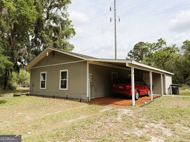 CHARMING TWO-BEDROOM EFFICIENCY COTTAGE TUCKED AWAY ON OVER A - photo 5