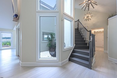 Experience luxurious riverfront living in this fully renovated - photo 27