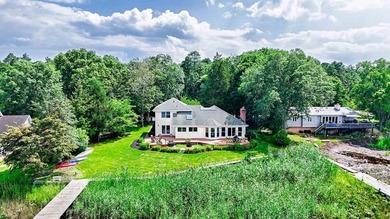 Experience luxurious riverfront living in this fully renovated - photo 48